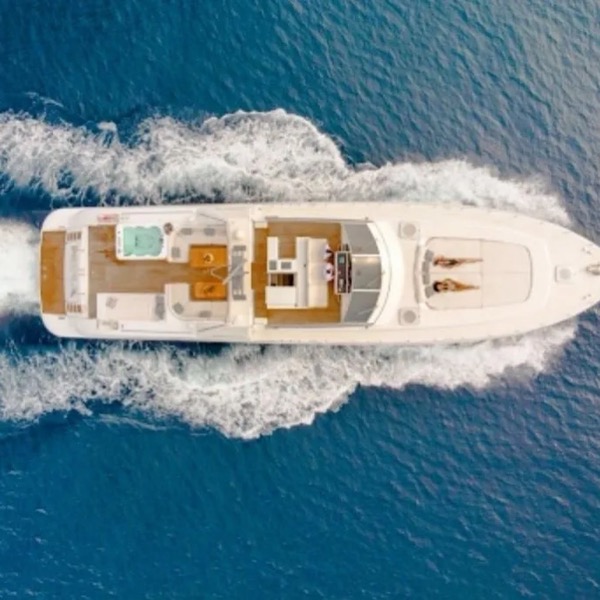 Boat Party in Marbella — Mangusta 80 from above with wake — 24 m sport yacht on the Costa del Sol