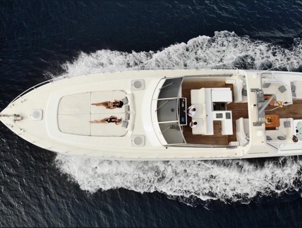 Catamaran Rental in Marbella — Sun pad on the foredeck of the Mangusta 80 — group day charter